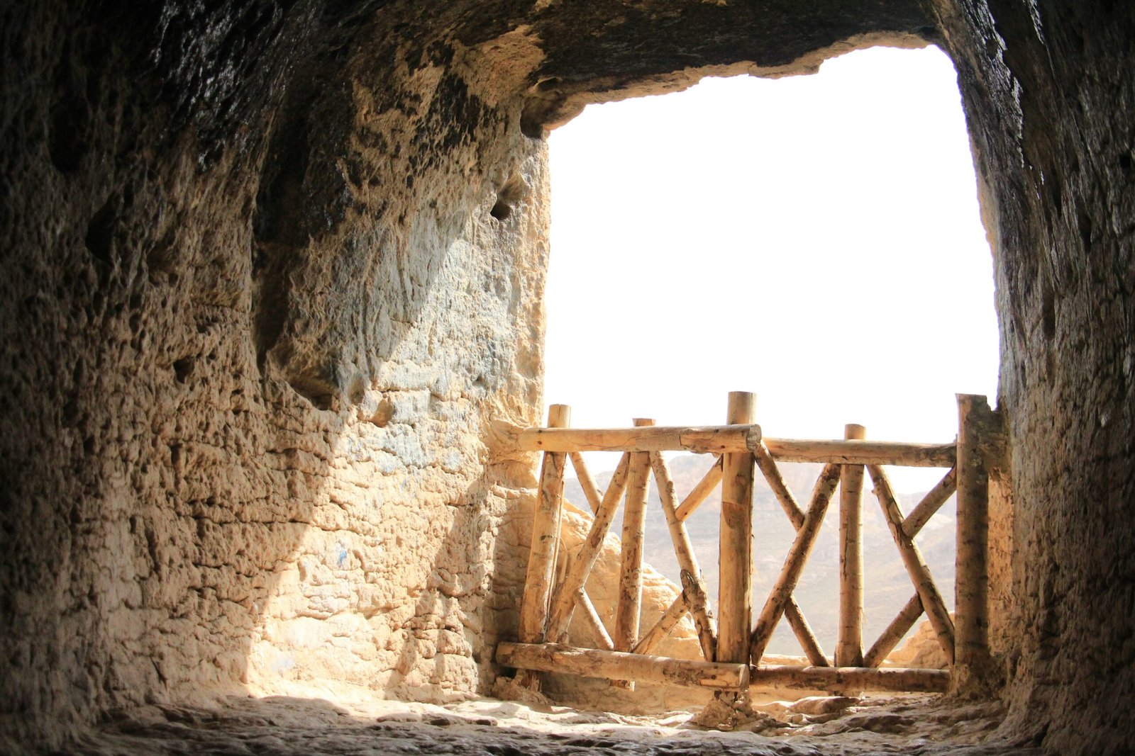 a wooden bridge in a cave